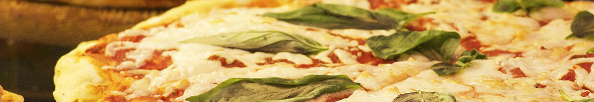 Eating Italian Pizza at Pasta-eria restaurant in Hicksville, NY.